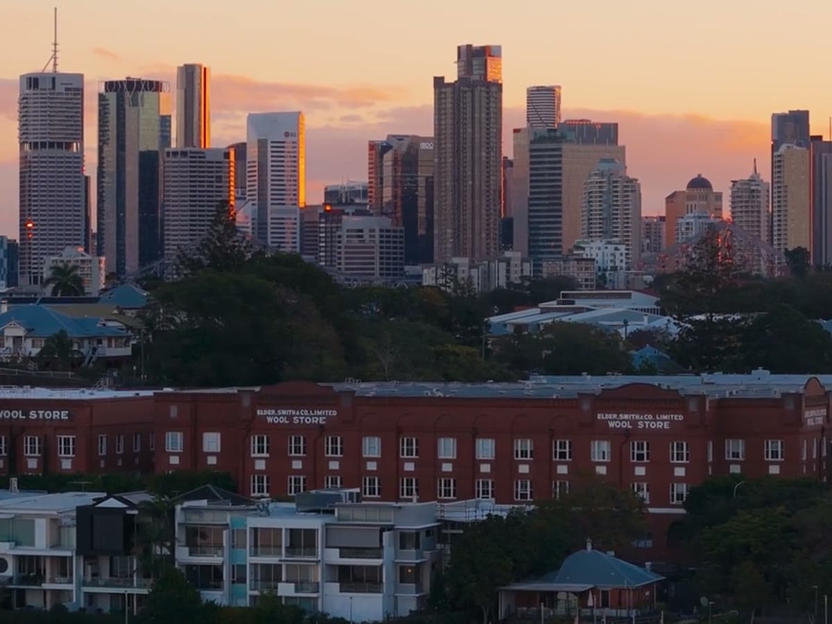 Teneriffe woolstores and the Brisbane CBD skyline at dusk